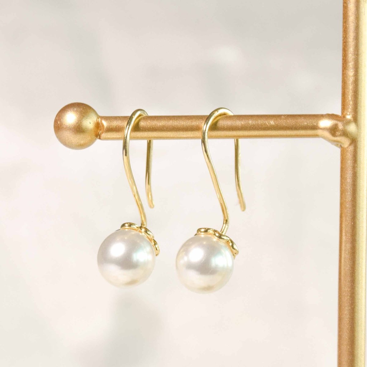 Elegant Pearl Drop Earrings - Upakarnaproduct_type