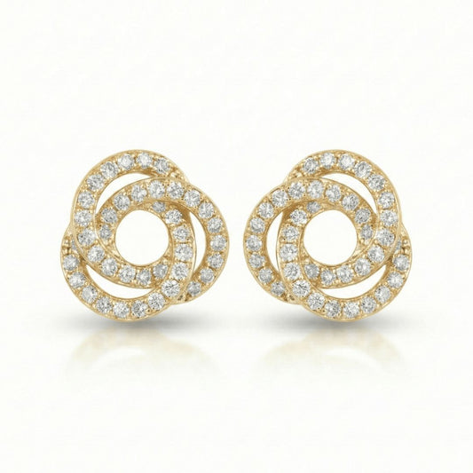 Gilded orbit studs with sparkling crystal detailing and an anti-tarnish silver finish, perfect for everyday wear and elegant styling.