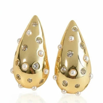 Gold-tone teardrop stud earrings featuring a polished surface decorated with scattered white pearl-like beads and clear crystal accents.