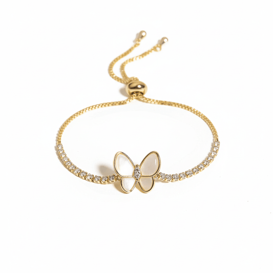 Mother of pearl butterfly bracelet with sparkling crystal detailing and an anti-tarnish finish, available in gold and rose gold, perfect for everyday wear and elegant styling.