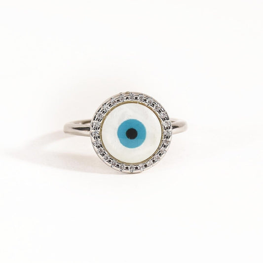 Round evil eye ring with sparkling crystal accents and an anti-tarnish silver finish, perfect for everyday wear, meaningful styling, and elegant statement looks.