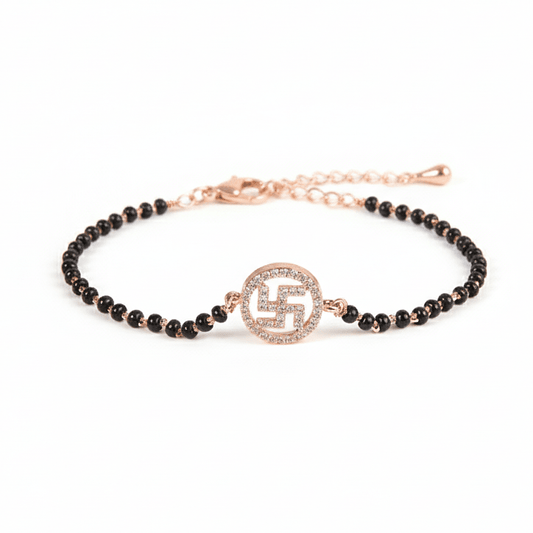 Swastika mangalsutra bracelet with pavé crystal detailing and an anti-tarnish rose gold finish, perfect for everyday wear and meaningful styling.