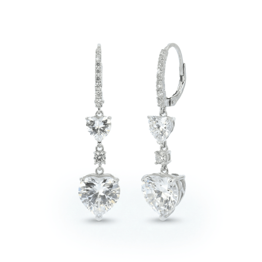 Sweetheart drop earrings with cascading heart-shaped crystal detailing and an anti-tarnish silver finish, perfect for evening wear and romantic styling.