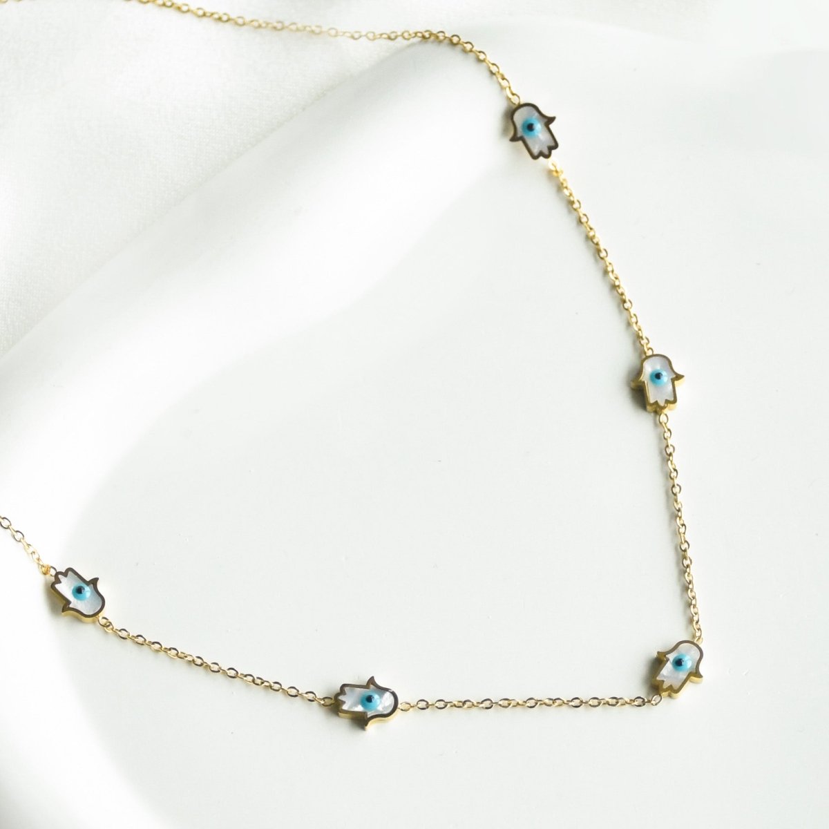 Tiny Evil Eye Hamsa Necklace - Upakarnaproduct_type