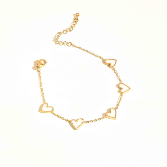 Tiny heart bracelet with a minimalist heart design and an anti-tarnish gold finish, perfect for everyday wear, elegant styling, and effortless layering.