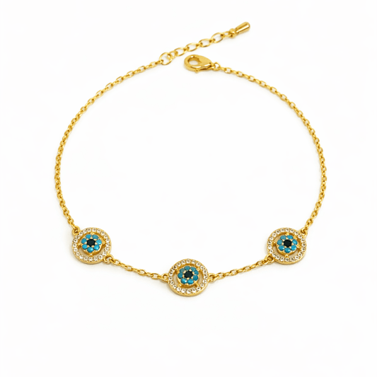 Zenith evil eye bracelet with turquoise crystal detailing and an anti-tarnish finish, available in gold and silver, perfect for everyday wear and meaningful styling.