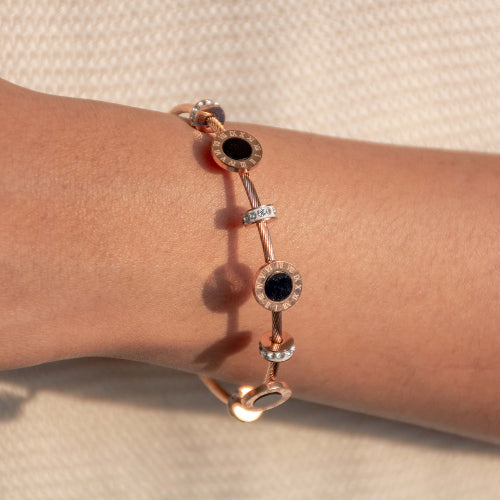 Elegant rosegold black pearl bangle with a secure magnetic lock and anti-tarnish finish, perfect for everyday elegance, chic stacking, and thoughtful gifting.
