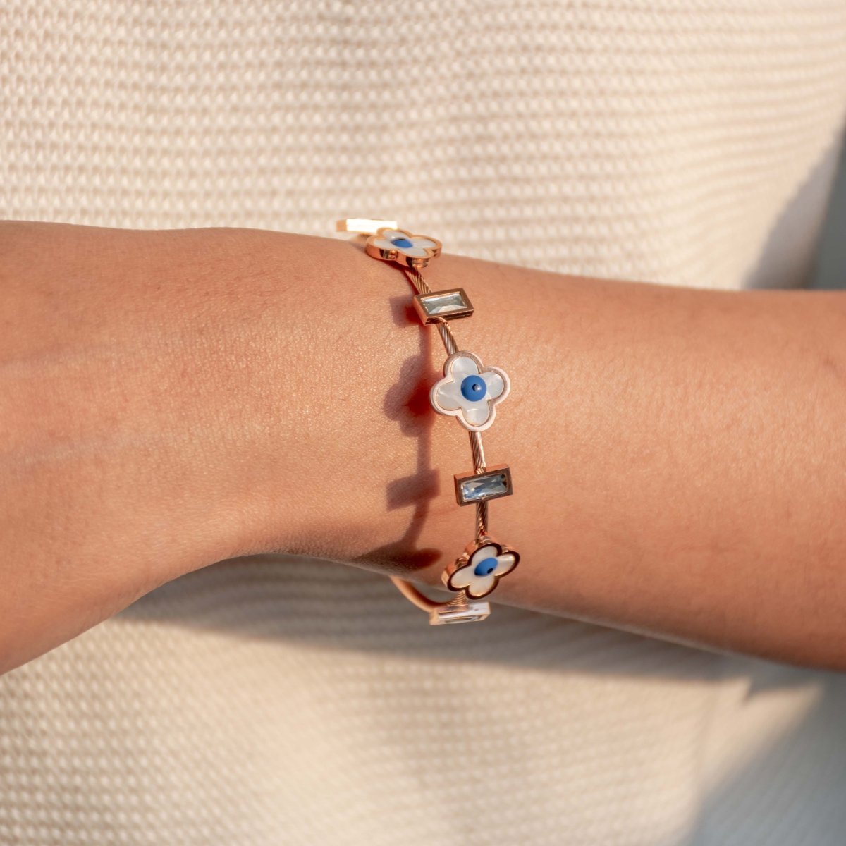 Elegant rosegold flower bangle with mother-of-pearl detailing, a secure magnetic lock, and an anti-tarnish finish, perfect for everyday chic styling and effortless elegance