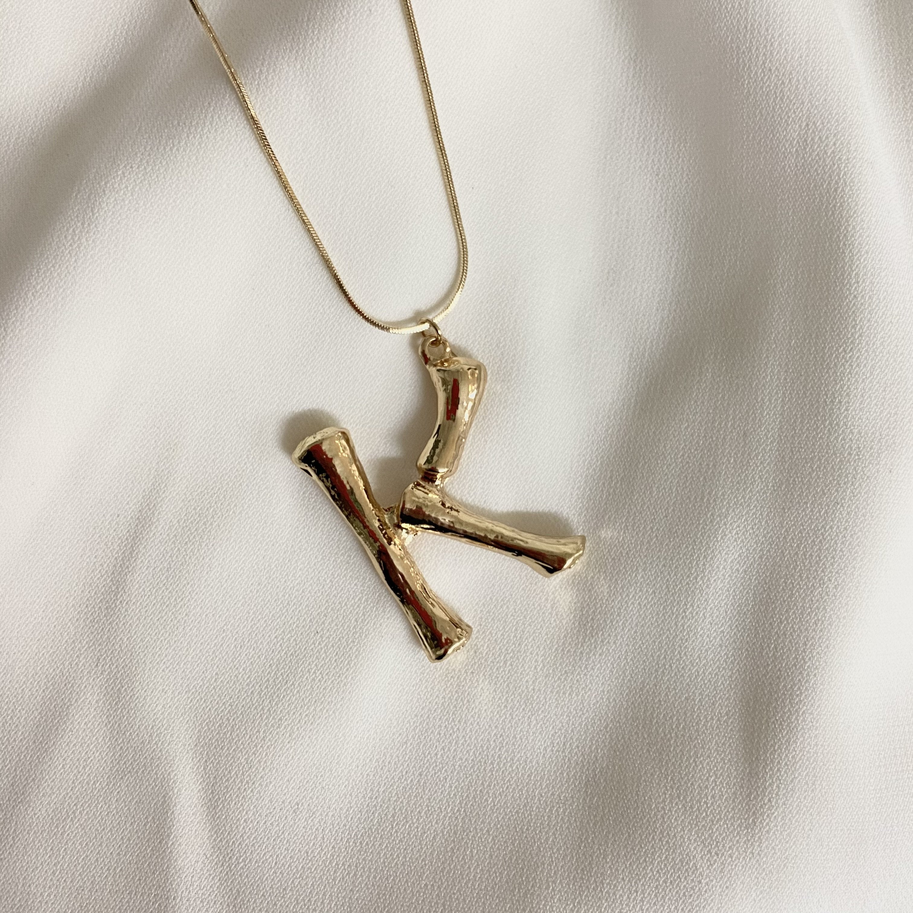 Initial Necklaces - Upakarna Initial Necklaces K A D golden 3