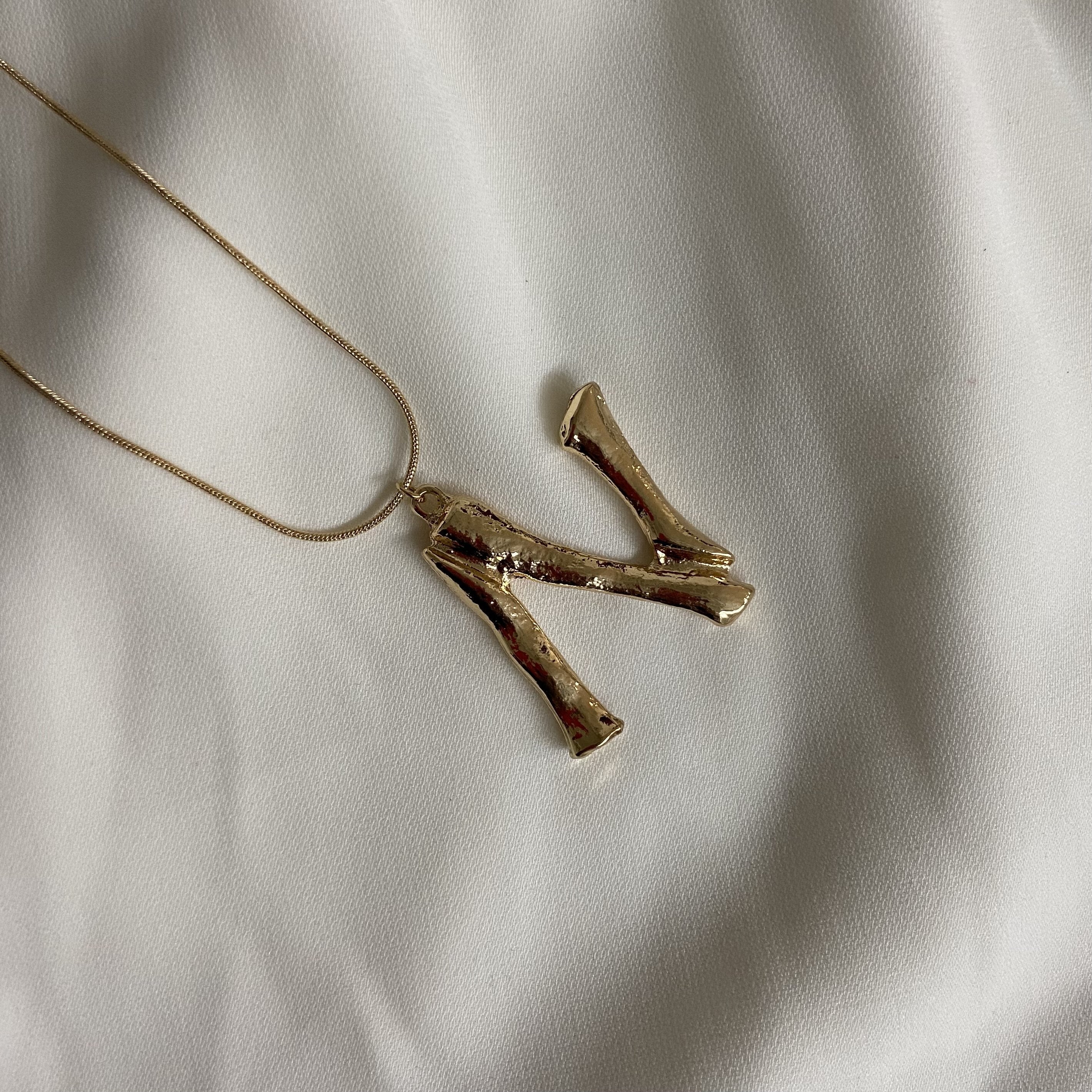 Initial Necklaces - Upakarna Initial Necklaces N A D golden 7
