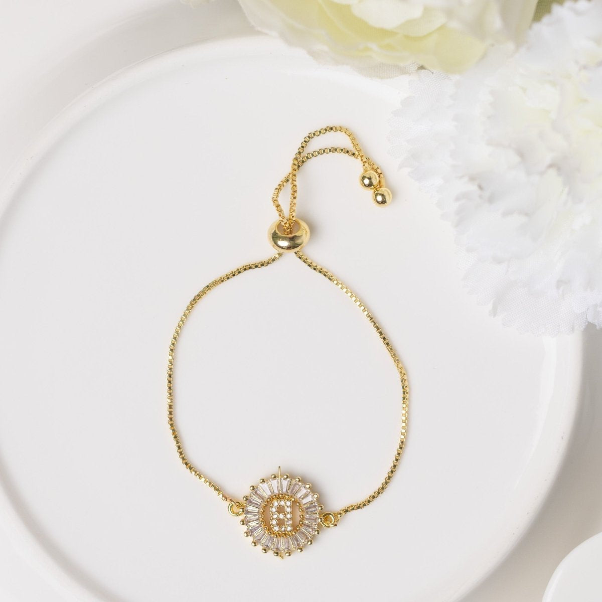 Personalized initial bracelet with an adjustable drawstring and anti-tarnish gold finish, perfect for everyday wear, meaningful styling, and thoughtful gifting.