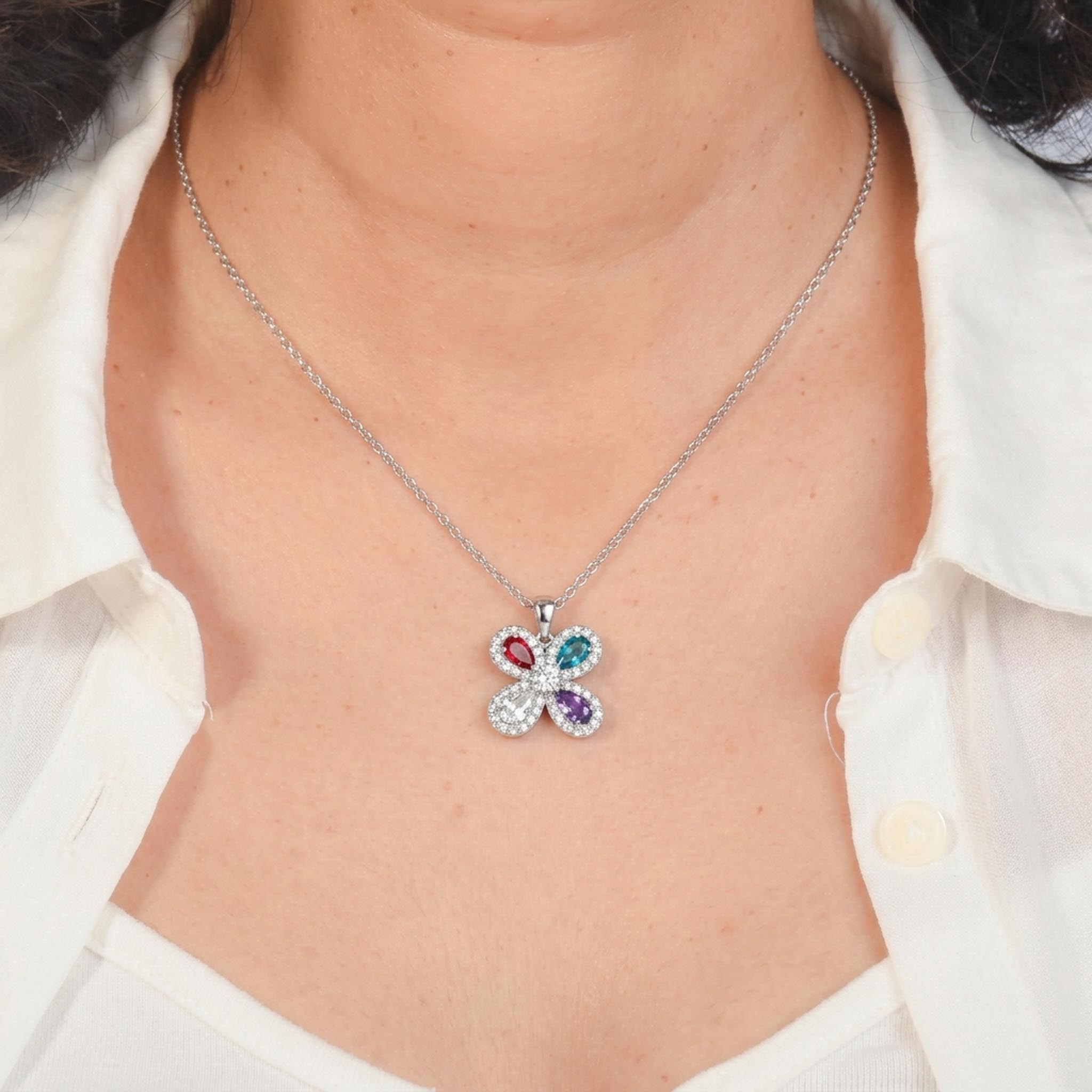 Multicolor Petals 925 sterling silver necklace featuring a floral pendant with sparkling marquise-cut crystals in red, blue, purple, and clear tones, set on a delicate silver chain