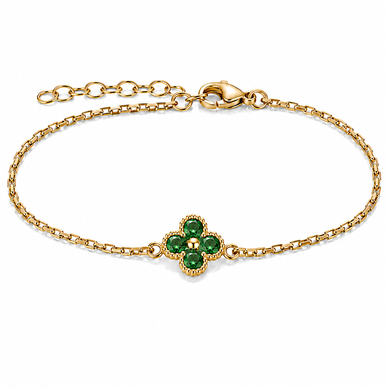 Gold-tone bracelet featuring a green four-petal flower charm with faceted stones, a delicate link chain, and an adjustable clasp on a white background.