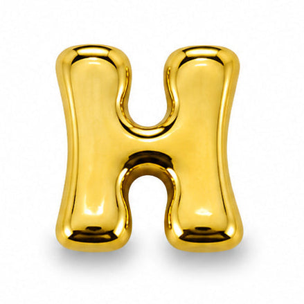 A small, glossy gold-tone letter “H” charm centered on a clean white background. The charm features a bold, rounded uppercase “H” with softly curved edges and a smooth, chunky three-dimensional construction. Its highly polished metallic surface creates warm golden reflections and highlights, while the open center between the vertical bars gives the letter a clean, balanced appearance.