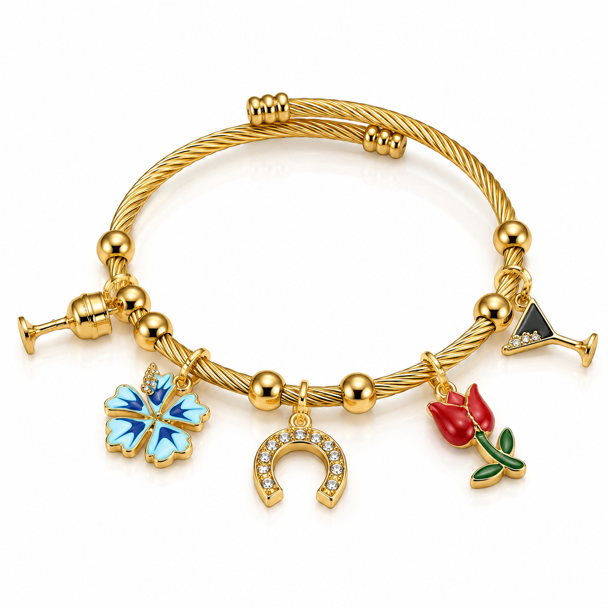 Gold-toned twisted wire charm bracelet featuring a blue butterfly, horseshoe, red tulip, and cocktail glass charms on a white background.
