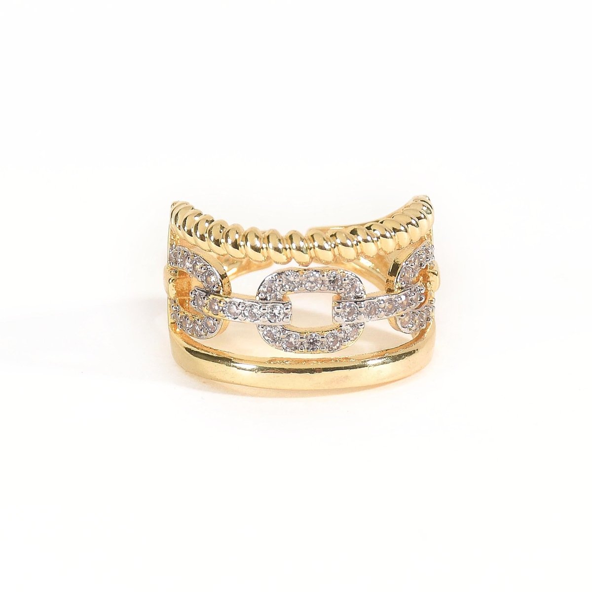 Bold golden multi-layered ring with pavé chain-link detailing and an anti-tarnish finish. perfect for modern glam, statement styling, and effortless day-to-night wear.
