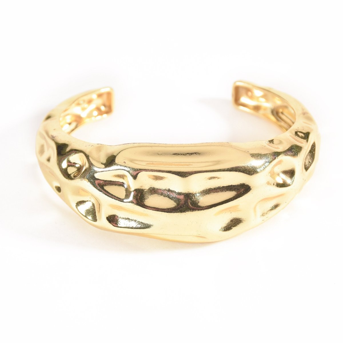 Bold golden abstract bangle with a sleek textured design and adjustable anti-tarnish finish, perfect for parties, events, and modern statement styling.
