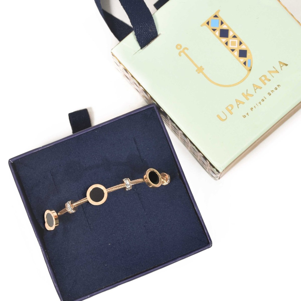 Elegant rosegold black pearl bangle with an anti-tarnish finish and magnetic lock design, perfect for everyday elegance, thoughtful gifting, and chic casual styling.