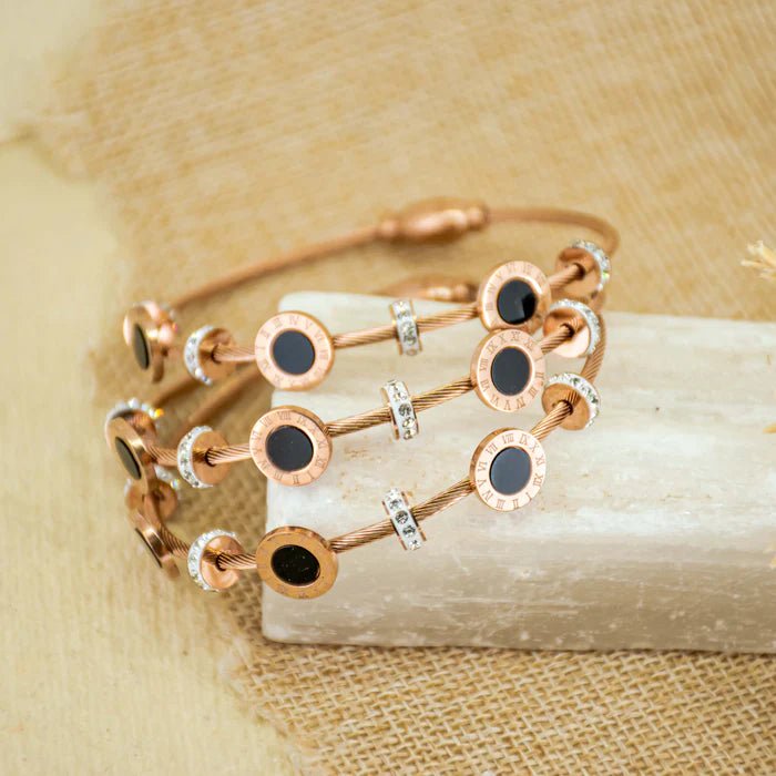 Elegant rosegold black pearl bangle with an anti-tarnish finish and magnetic lock design, perfect for everyday elegance, thoughtful gifting, and chic casual styling.