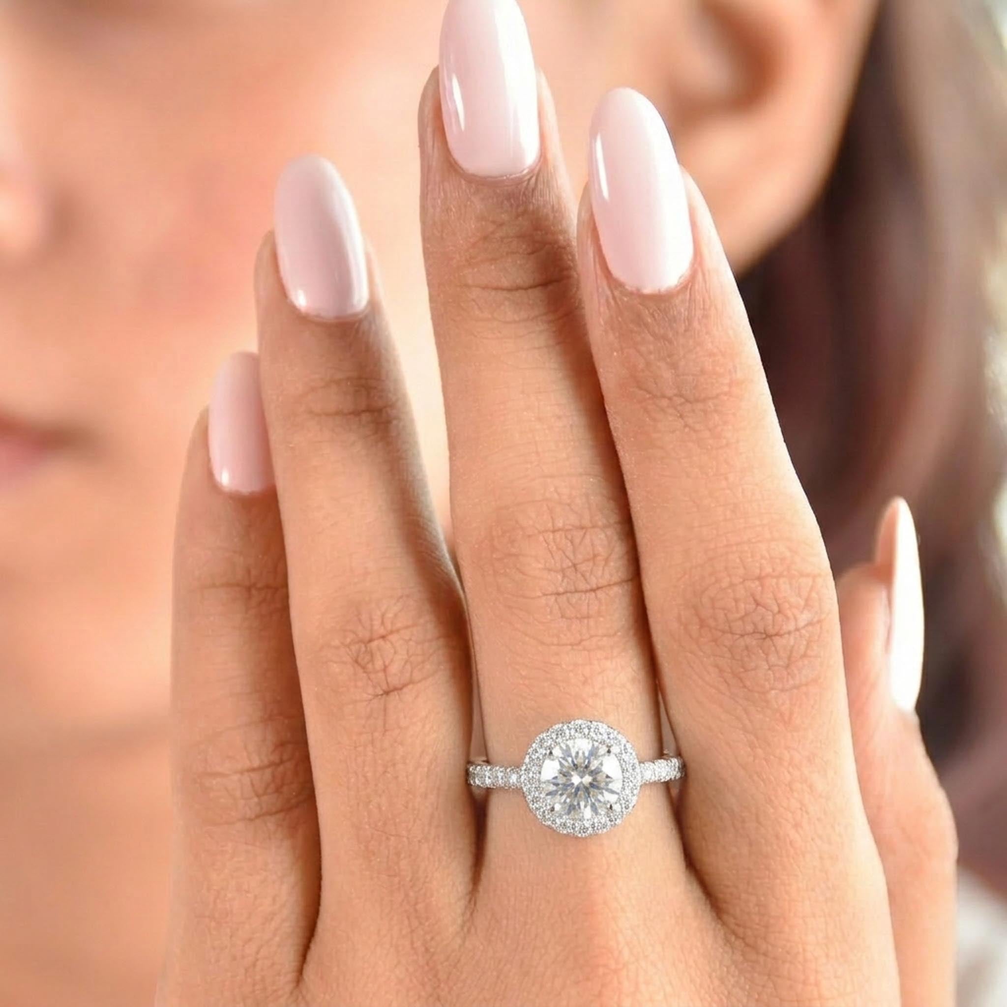 Classic Diamond 925 Sterling Silver Ring with a round brilliant-cut center diamond, halo setting, and pave diamond band in polished sterling silver