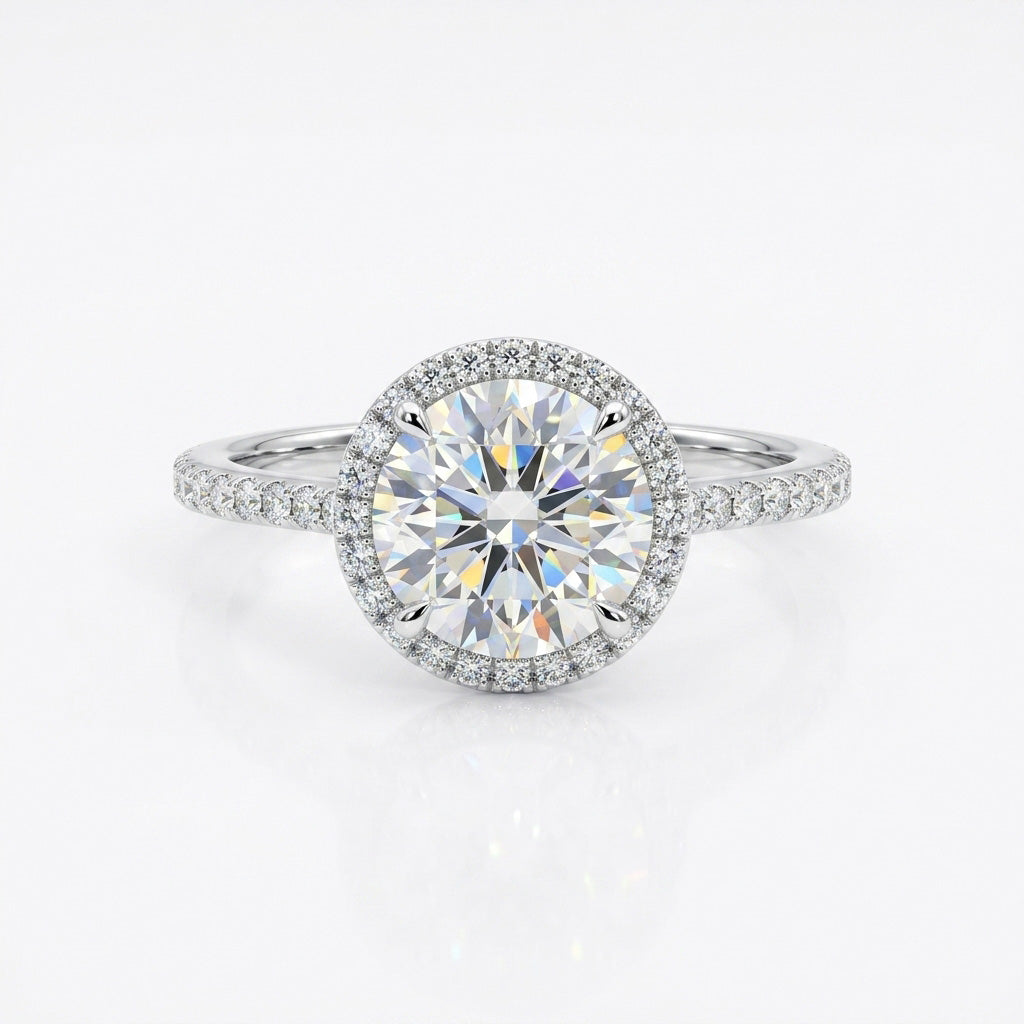 Classic Halo Spark Ring with a round-cut center stone, sparkling halo setting, and slim pavé band for timeless elegance.