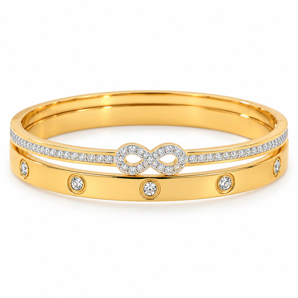 A set of two polished gold-toned bangles displayed together as a coordinated stack.