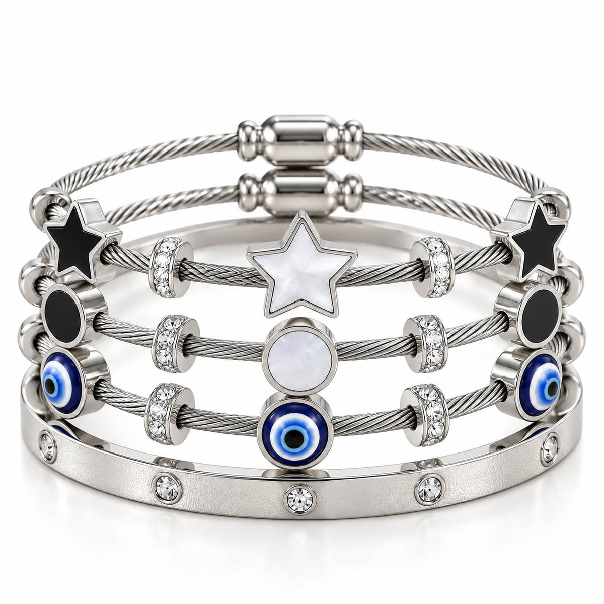 A product photo of a stacked set of silver-tone bracelets featuring twisted cable wire bands, star and circular mother-of-pearl stations, black enamel accents, blue-and-white evil eye beads, and a crystal-set bangle.