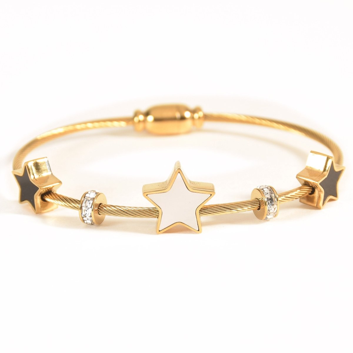 Elegant star bangle with delicate celestial detailing and an anti-tarnish finish, available in rosegold, perfect for everyday wear, youthful styling, and chic minimal looks.
