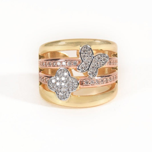 Luxurious golden multi-band ring with sparkling clover and butterfly motifs in an anti-tarnish finish. perfect for statement styling, elegant occasions, and everyday glamour.
