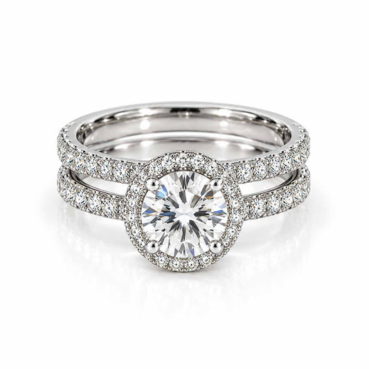 Silver oval-shaped center stone crystal ring with pavé stones on a clean white background