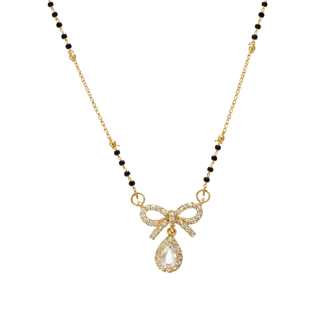 Minimal crystal mangalsutra featuring a delicate bow detail and sparkling teardrop charm