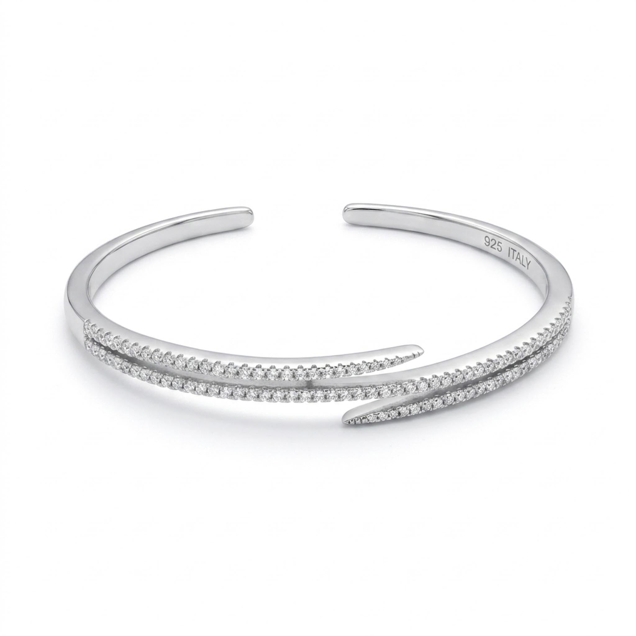 Crystal Embrace 925 Sterling Silver Bangle with a contemporary crossover open-cuff silhouette, shimmering cubic zirconia detailing, and a polished sterling silver finish