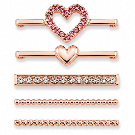 Rose gold-tone watch charms featuring a pink crystal heart outline, polished heart detail, crystal-studded bar, beaded chain design, and twisted chain design, displayed on a white background.