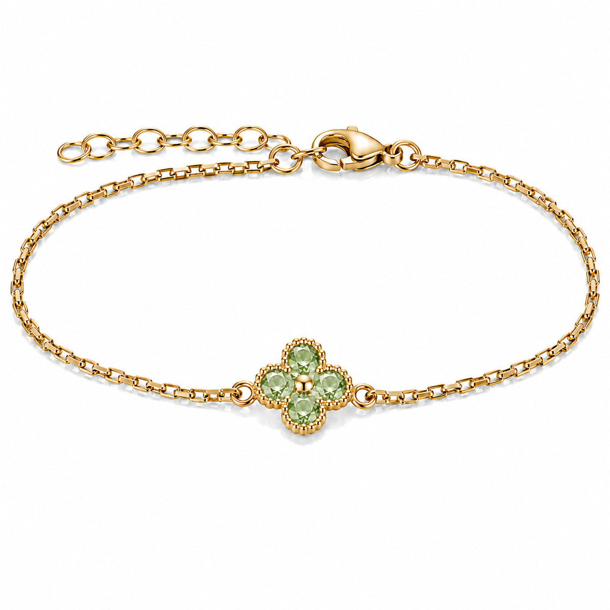 Gold-plated bracelet featuring a delicate four-leaf clover charm with four light mint-green stones, set on a fine gold chain with an adjustable extension chain and lobster clasp, displayed against a clean white background.