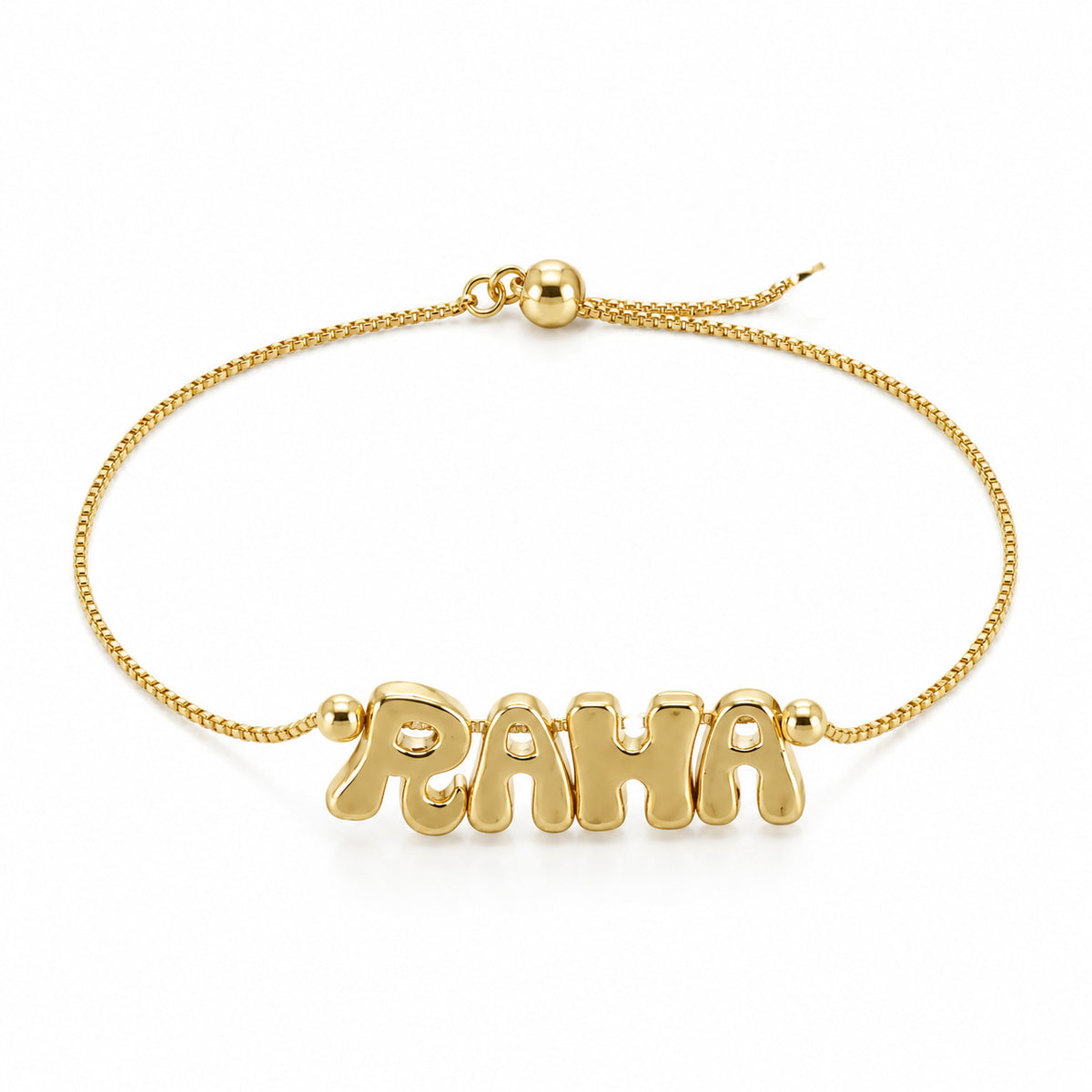 Gold-plated personalized bracelet featuring the name “RAHA” on a delicate adjustable chain with a round bead slider, displayed on a clean white background.