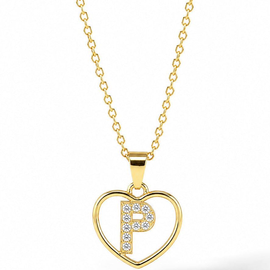 Gold-plated personalized heart necklace featuring a sparkling pavé “P” initial inside an elegant heart outline, displayed on a delicate gold chain against a clean white background.