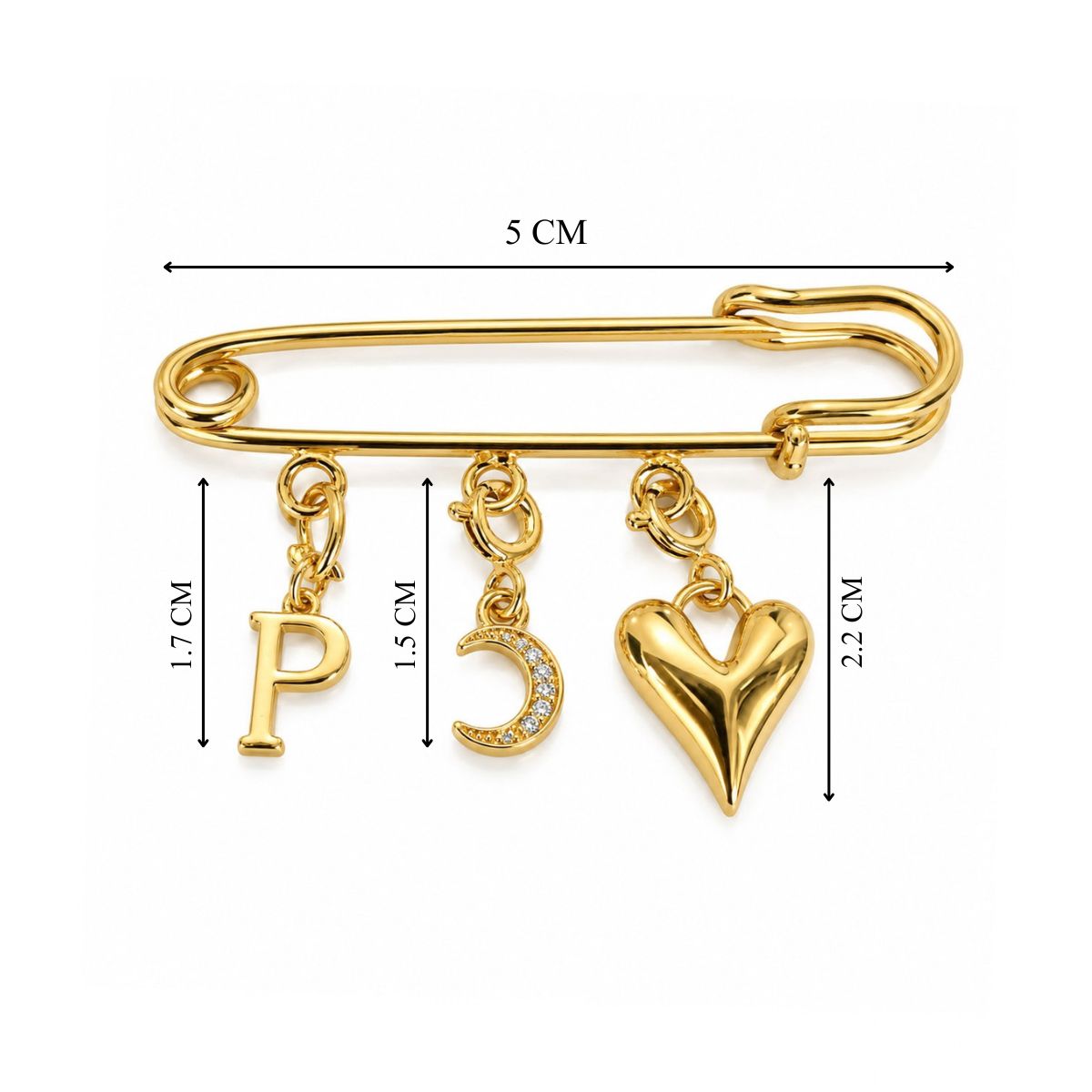 Gold-tone safety pin charm brooch featuring three dangling charms—a crystal-studded letter P, a crystal-accented crescent moon, and a polished heart—with measurements labeled on the image.