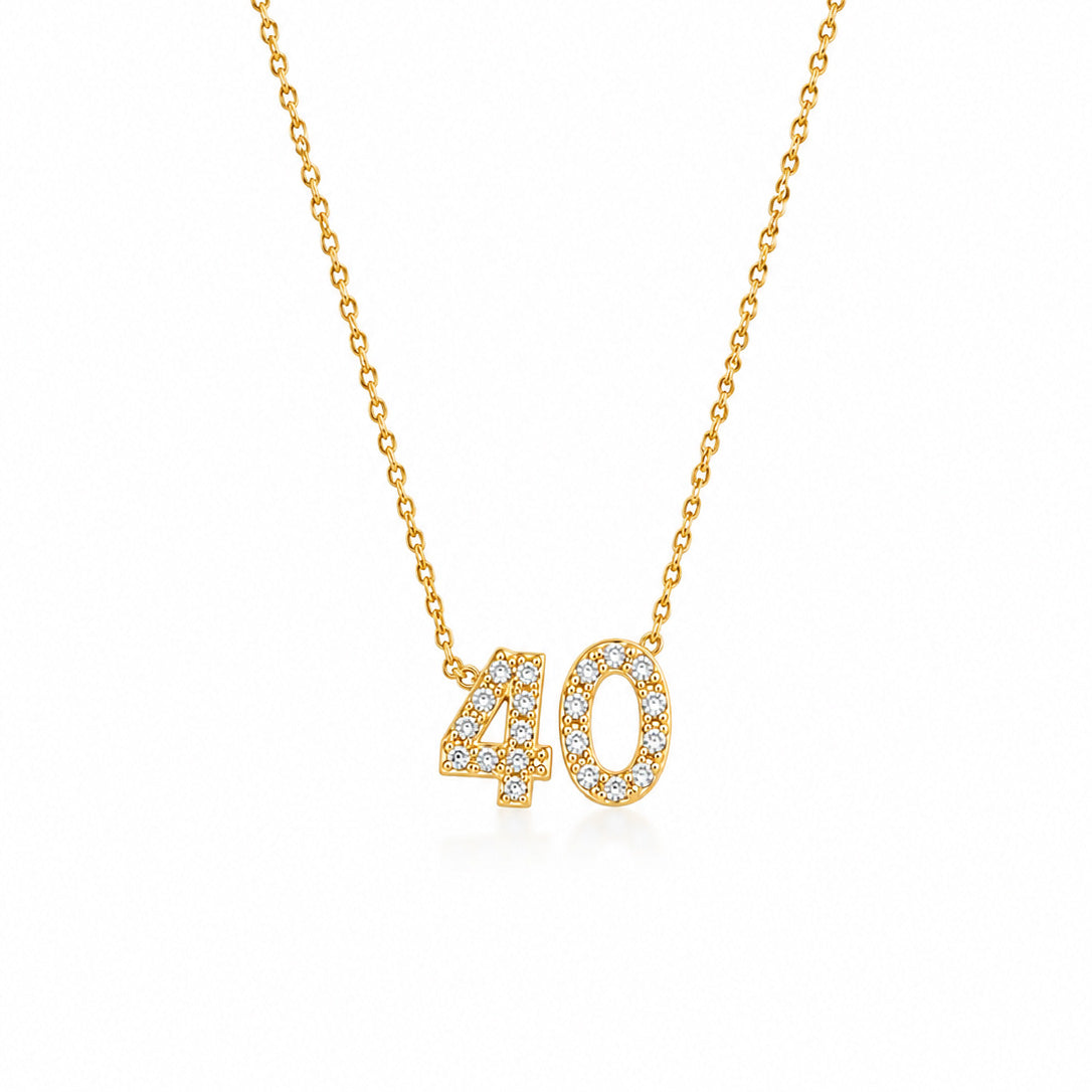 Gold-plated personalized number necklace featuring a sparkling pavé “40” pendant on a delicate gold chain, displayed against a clean white background.