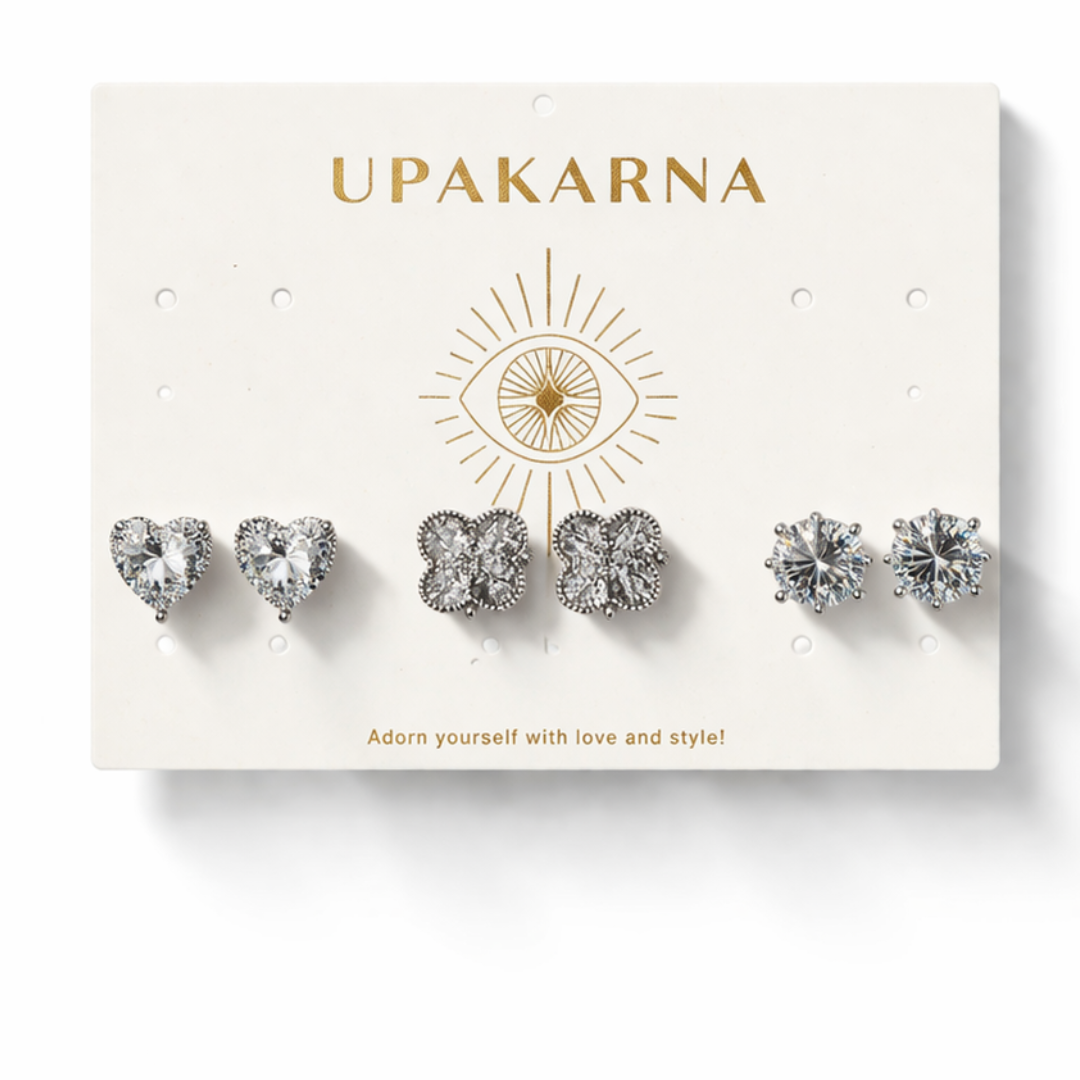 Diamond stud earring stack with heart studs, clover studs, and single stone studs in silver-tone finish