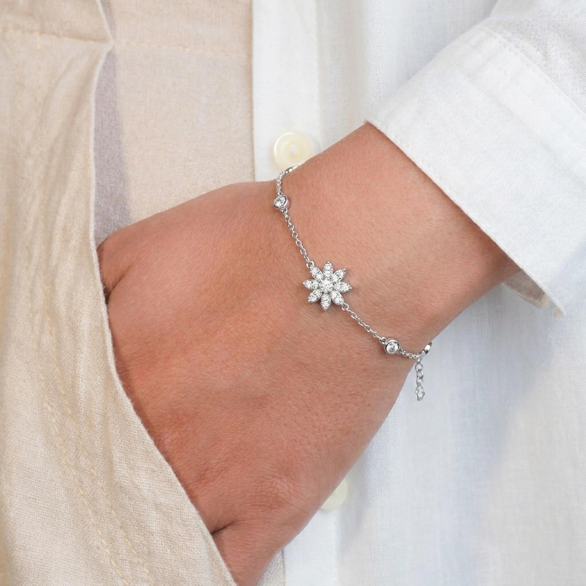 Diamond Petal 925 Sterling Silver Bracelet featuring a sparkling flower-shaped centerpiece adorned with pave-set stones, accented by bezel-set round crystals along a delicate sterling silver chain