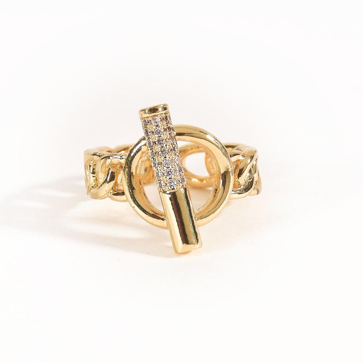 Elegant golden clasp-detail ring with a polished anti-tarnish finish and adjustable design, perfect for stacking, modern styling, and everyday glam.
