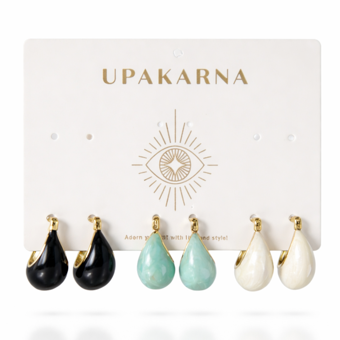 gold pastel earring stack with turquoise blue, pink and black enamel earrings lightweight trendy jewellery
