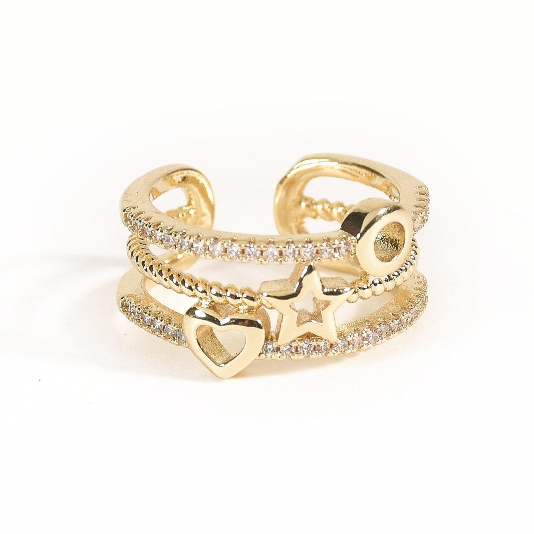 Elegant golden triple-band ring with heart, star, and circle crystal charms, featuring an adjustable anti-tarnish finish, perfect for meaningful gifting and dreamy everyday styling.
