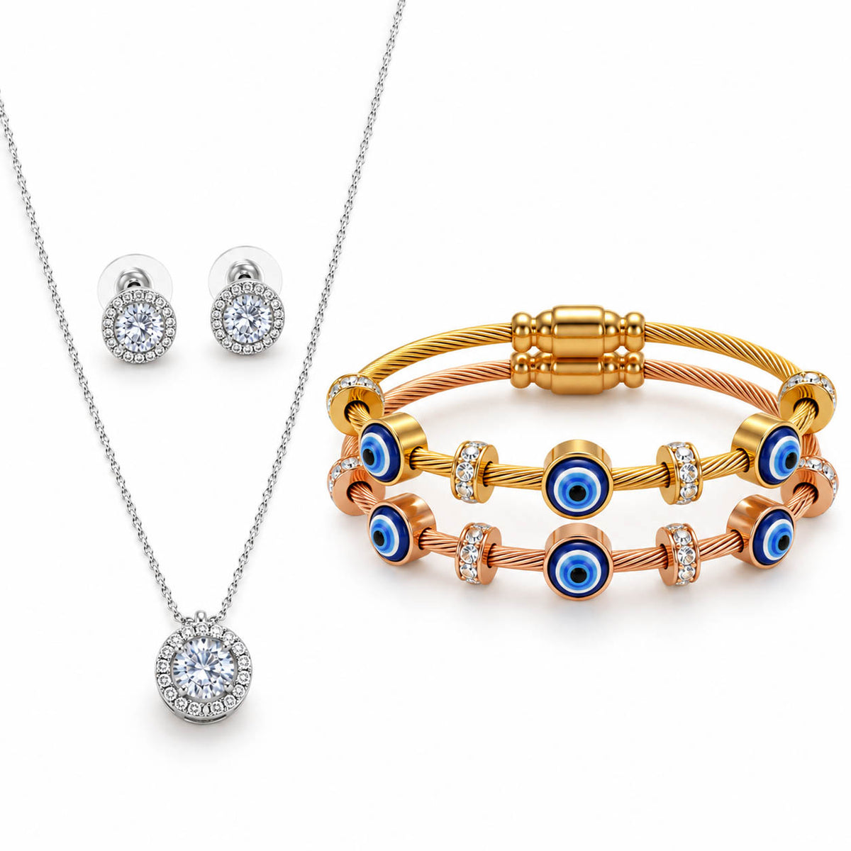Silver crystal pendant necklace with matching stud earrings paired with two stacked gold and rose gold anti-tarnish cable bracelets featuring blue Evil Eye charms, crystal accent beads, and adjustable sliding clasps for a premium everyday jewelry set.