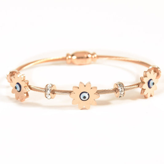Elegant rosegold evil eye bangle with floral detailing, a secure magnetic lock, and an anti-tarnish finish, perfect for everyday wear, parties, and chic versatile styling.
