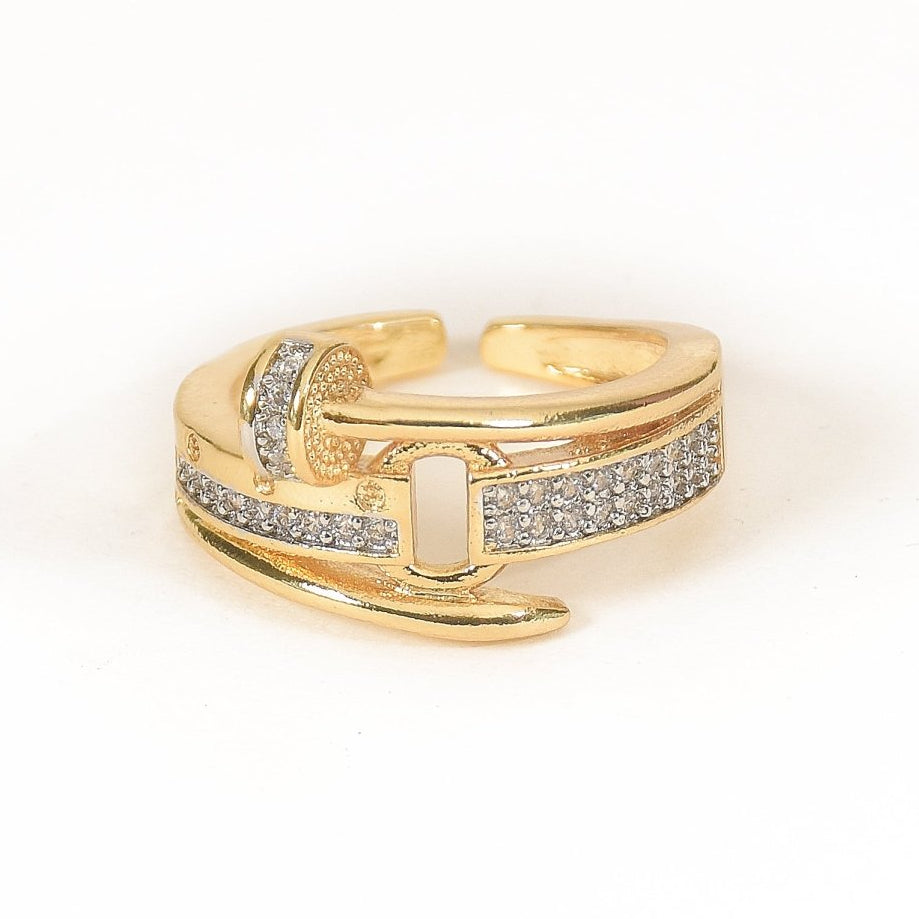 Bold golden nail-inspired ring with sparkling pavé detailing and an adjustable anti-tarnish finish, perfect for modern statement styling and standout gifting.
