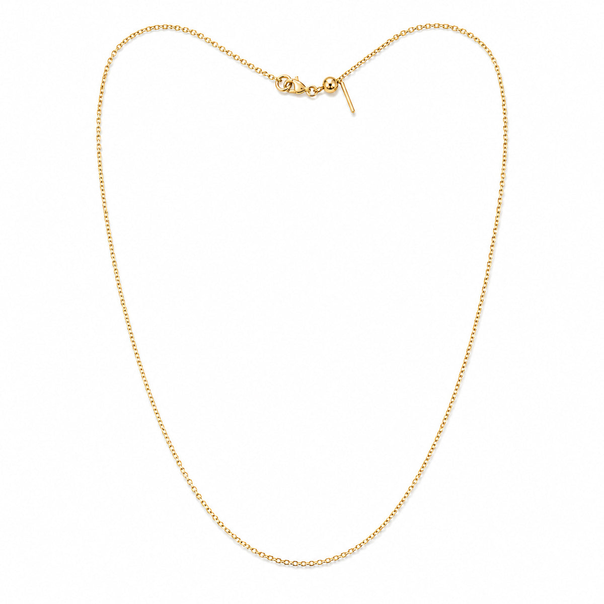 Delicate gold-tone chain necklace with a fine linked chain, lobster clasp, and adjustable extender, arranged in a long oval on a clean white background.