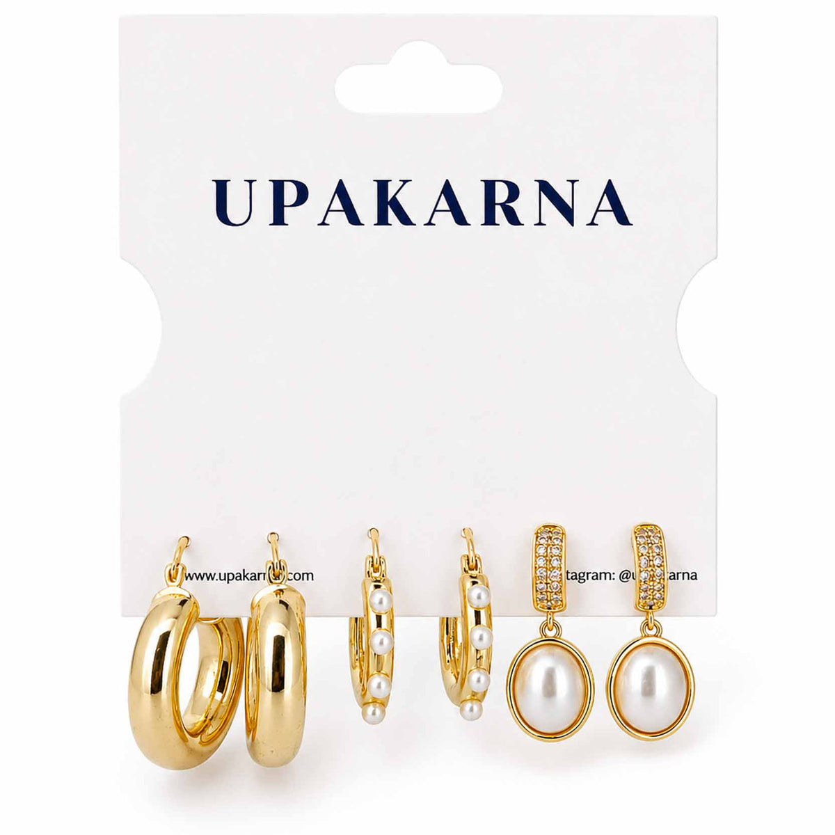 Gold-tone earring stack featuring chunky polished hoops, pearl-lined hoops, and pearl drop earrings with sparkling crystal detailing, displayed on a clean white background.