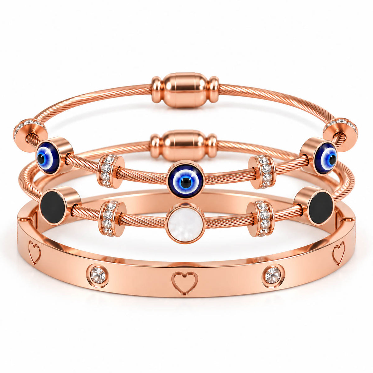 Three rose gold anti-tarnish bracelets feature blue Evil Eye charms, black and white enamel accents, sparkling crystal beads, and a heart-detail bangle with a secure lock, creating a premium everyday stack with a polished finish.