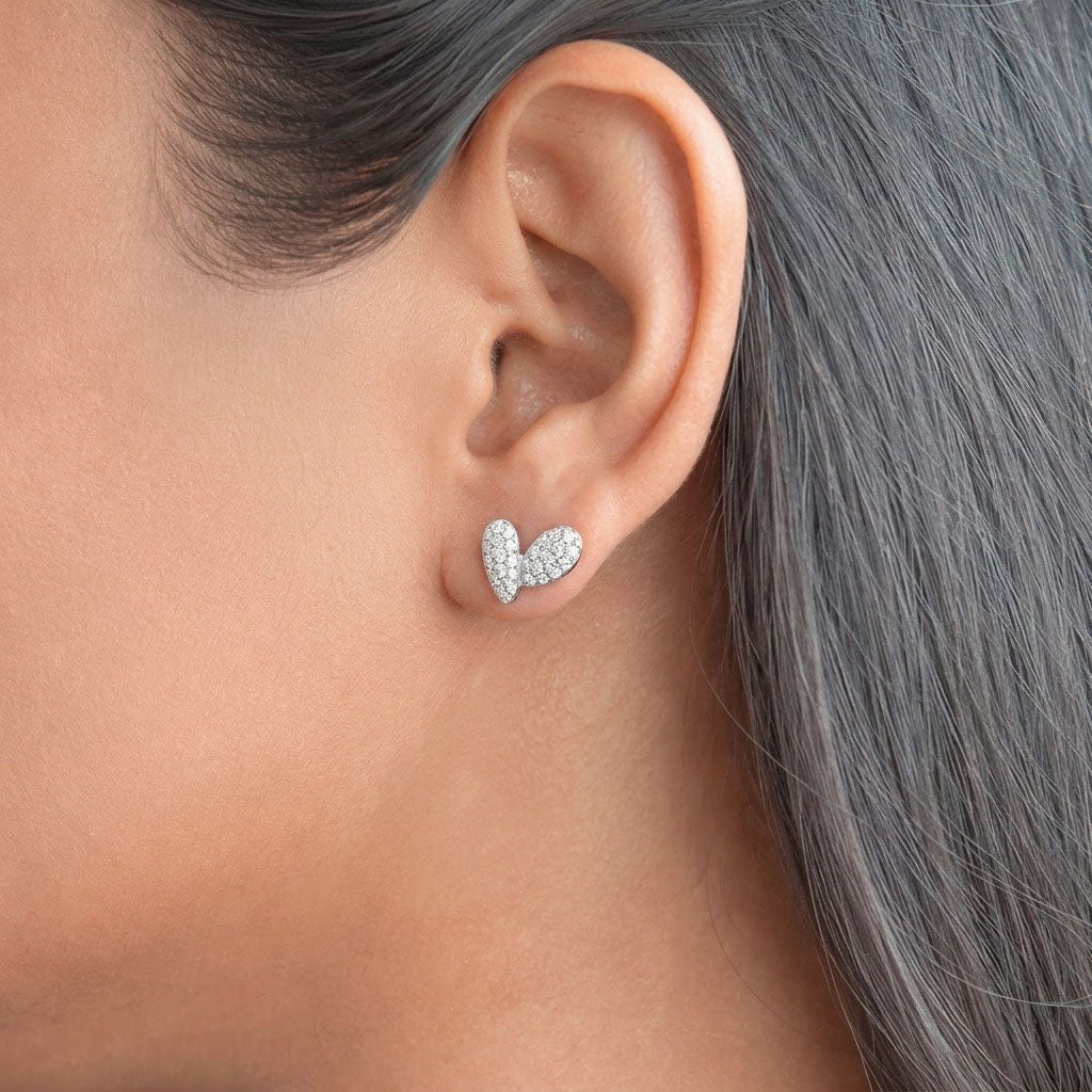 Heart Grace 925 Sterling Silver Earrings featuring a delicate open-heart design adorned with sparkling pave-set cubic zirconia stones